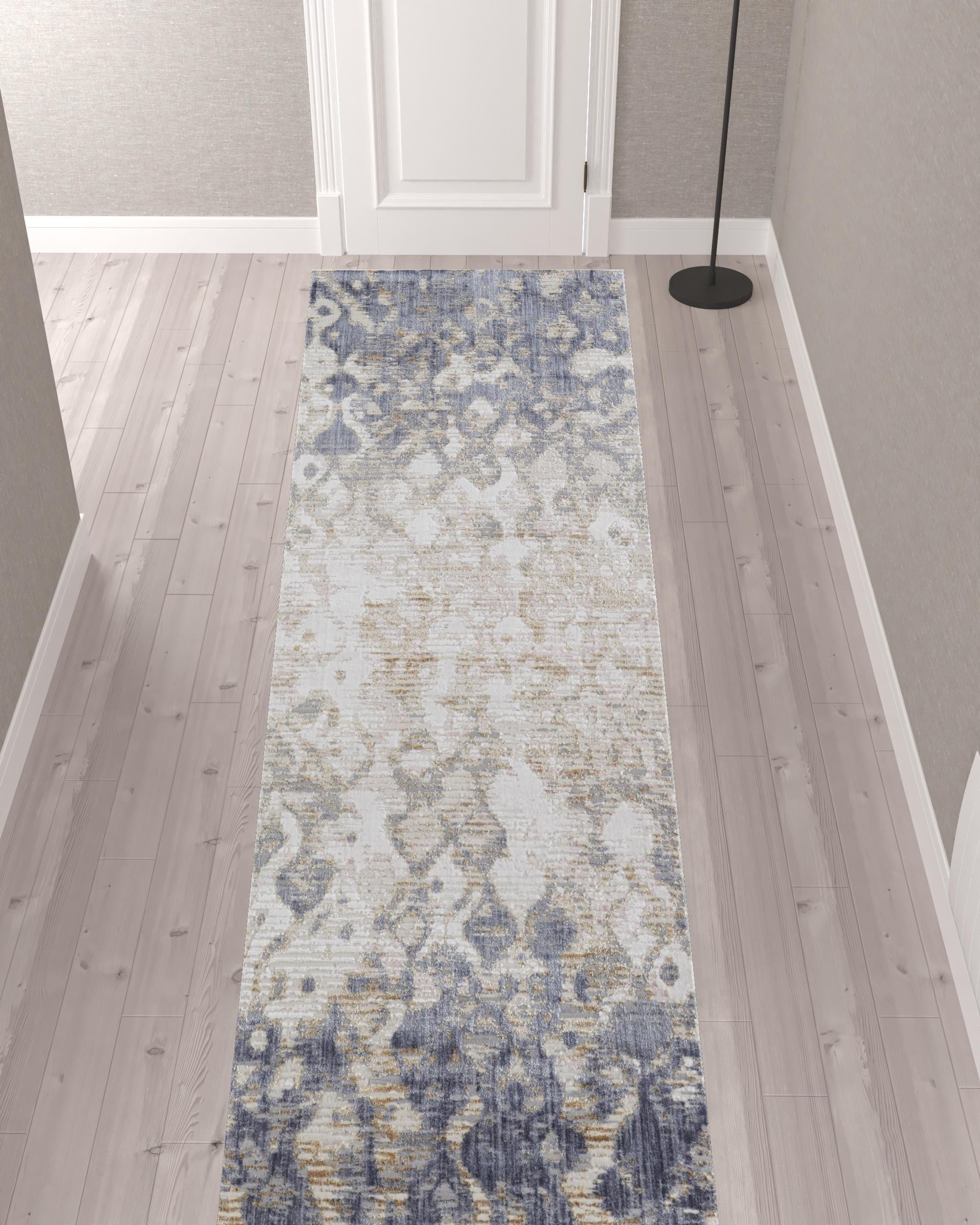 12" Tan Ivory And Blue Abstract Power Loom Distressed Runner Rug