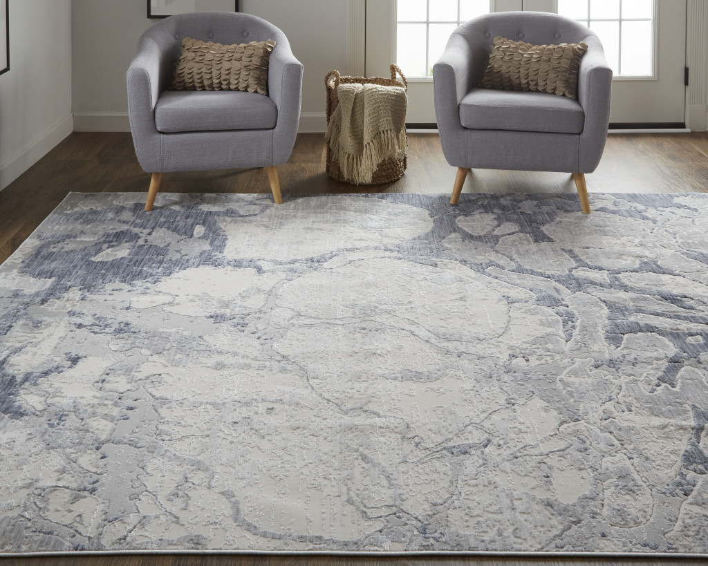5" X 8" Ivory And Blue Abstract Power Loom Distressed Area Rug