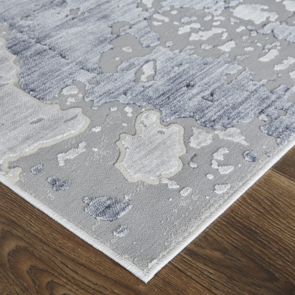 5" X 8" Ivory And Blue Abstract Power Loom Distressed Area Rug