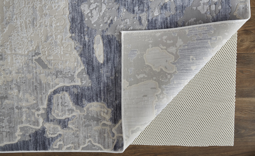 5" X 8" Ivory And Blue Abstract Power Loom Distressed Area Rug