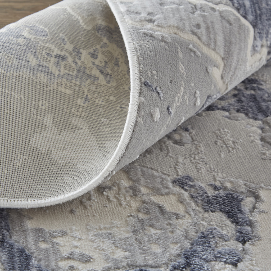 5" X 8" Ivory And Blue Abstract Power Loom Distressed Area Rug