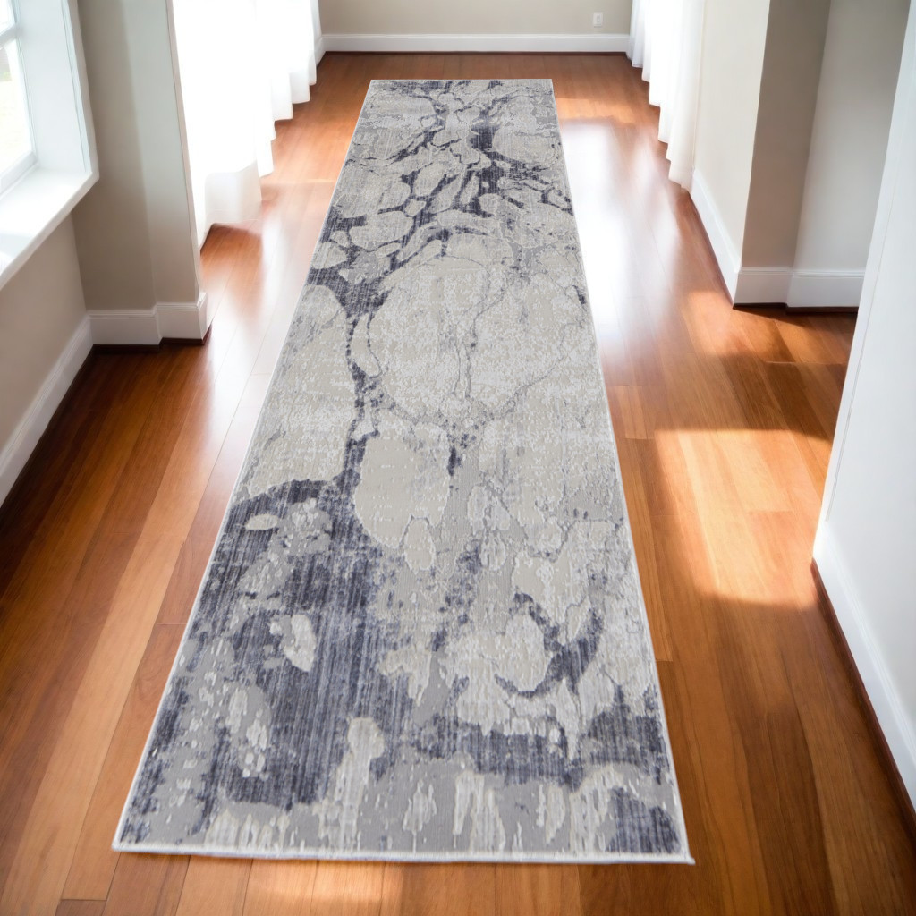 10" Ivory and Blue Abstract Power Loom Distressed Non Skid Runner Rug