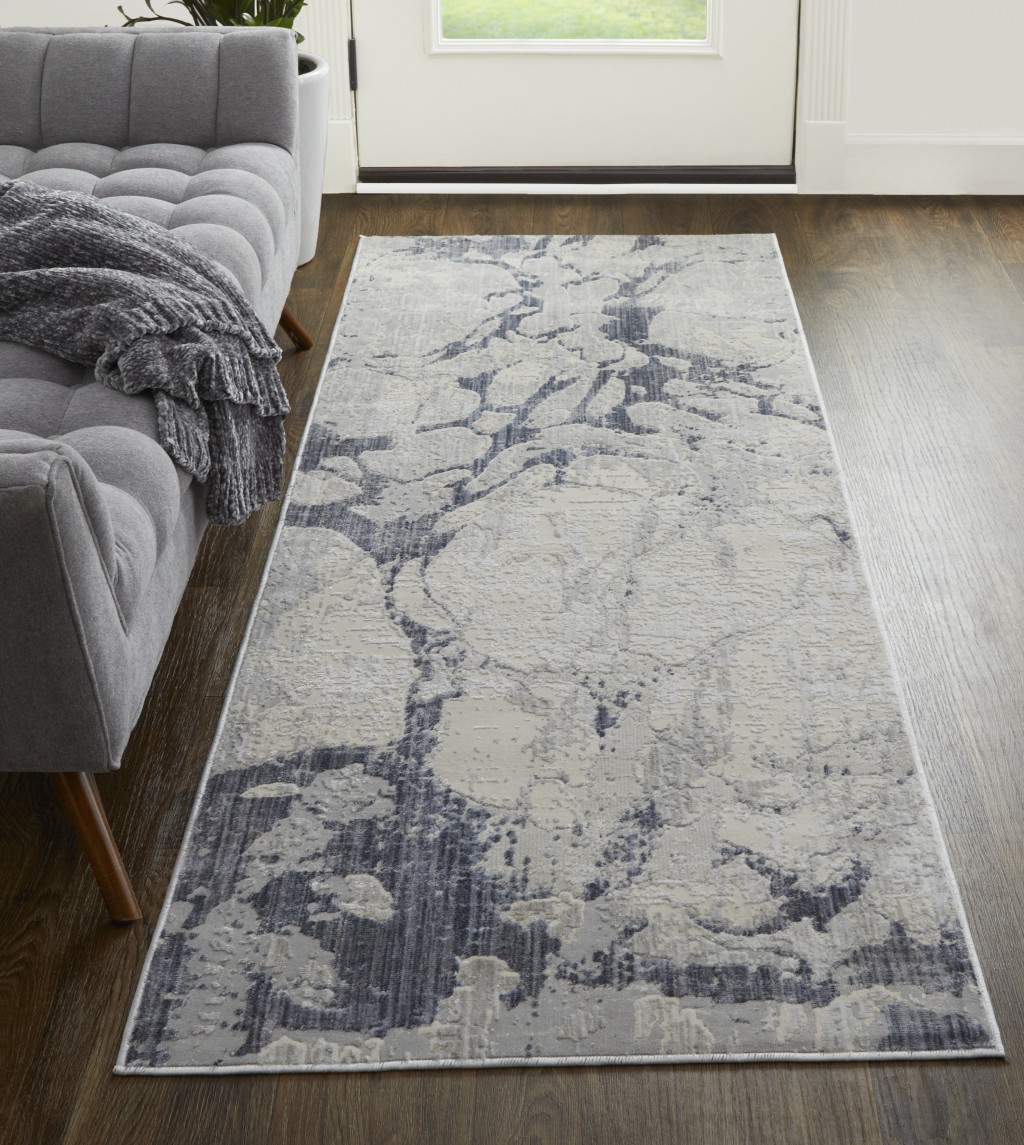 8" Ivory And Blue Abstract Power Loom Distressed Runner Rug
