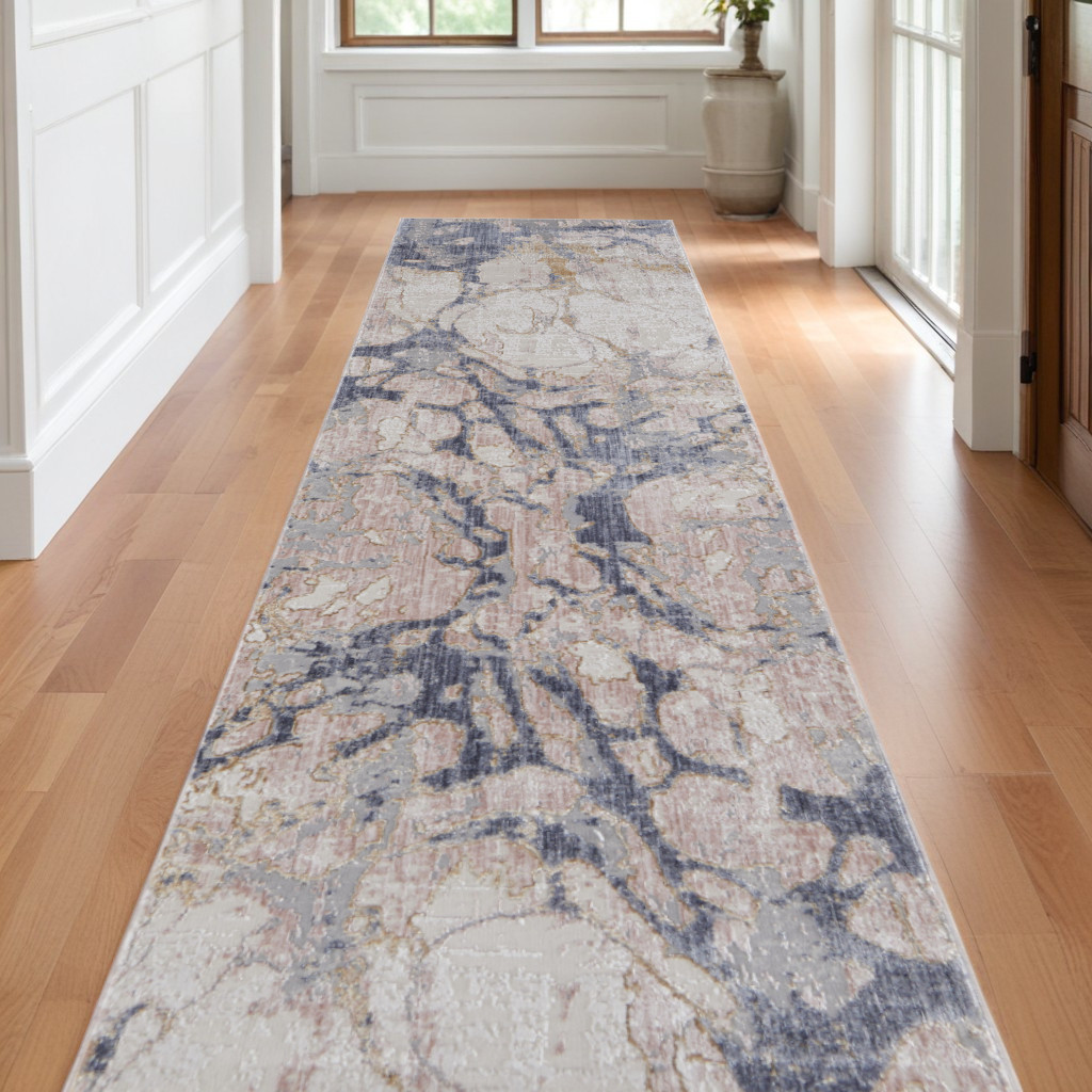 10" Tan and Blue Abstract Power Loom Distressed Non Skid Runner Rug