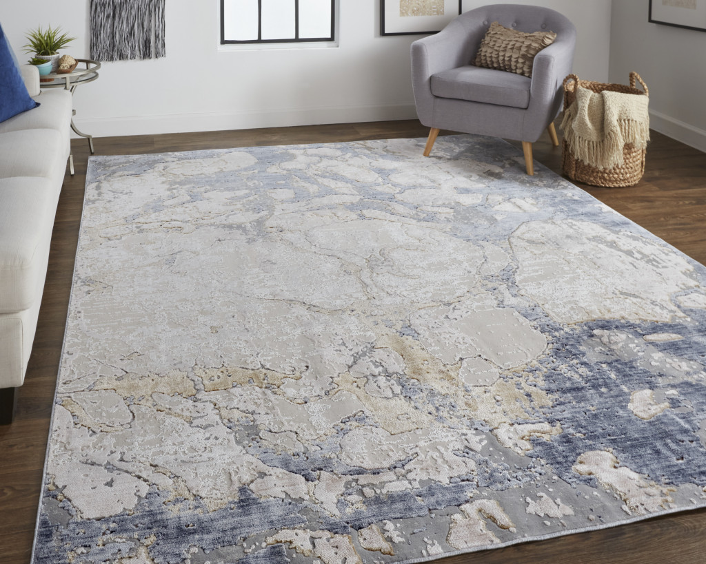 2" X 3" Tan And Blue Abstract Power Loom Distressed Area Rug