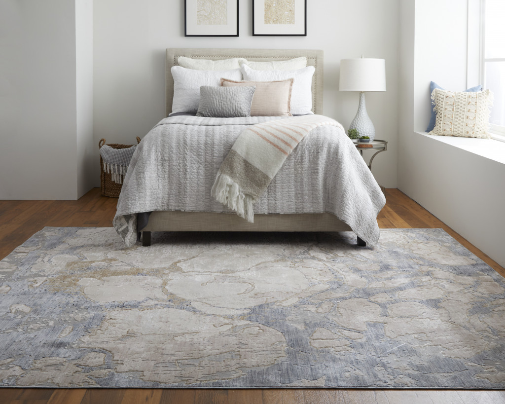 2" X 3" Tan And Blue Abstract Power Loom Distressed Area Rug