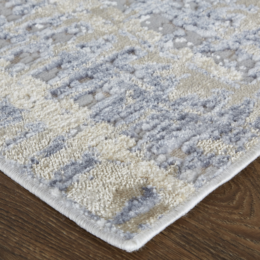 2" X 3" Tan Brown And Blue Abstract Power Loom Distressed Area Rug