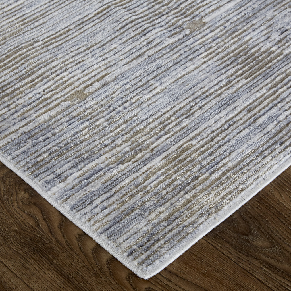 2" X 3" Taupe Silver And Tan Abstract Power Loom Area Rug