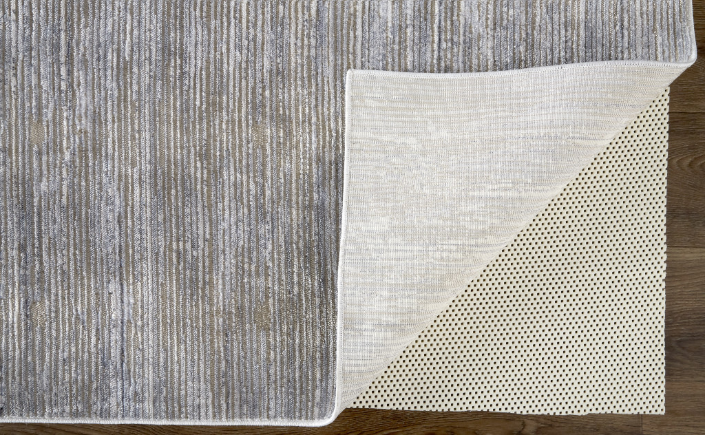 2" X 3" Taupe Silver And Tan Abstract Power Loom Area Rug