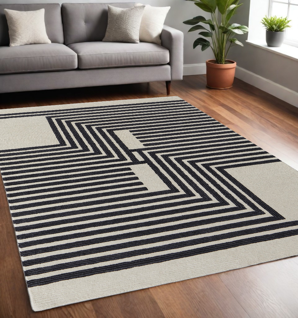 5" X 8" Black and Ivory Abstract Geometric Hand Tufted Area Rug
