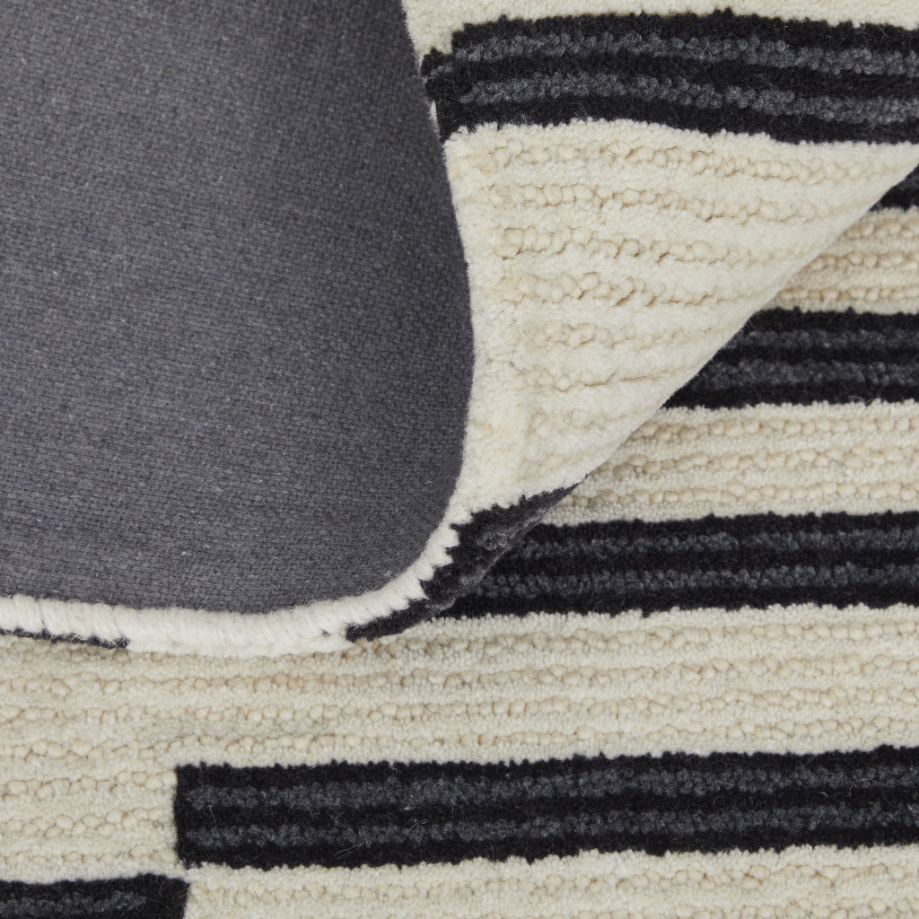 4" X 6" Ivory and Black Wool Abstract Hand Tufted Area Rug