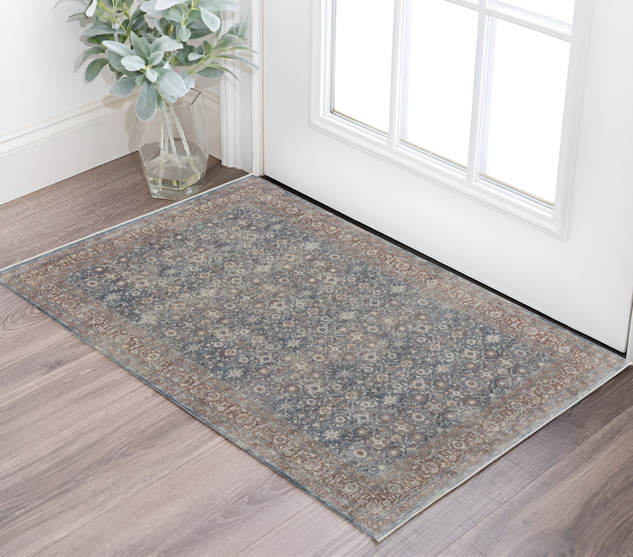 2" X 3" Blue and Beige Floral Power Loom Area Rug