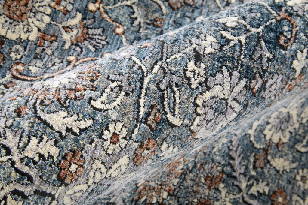 2" X 3" Blue and Beige Floral Power Loom Area Rug