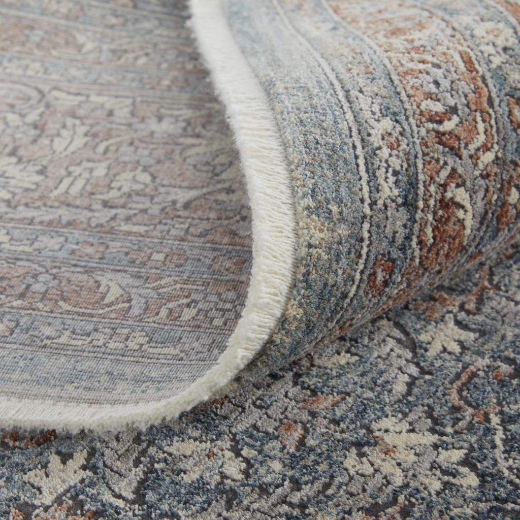 2" X 3" Blue and Beige Floral Power Loom Area Rug