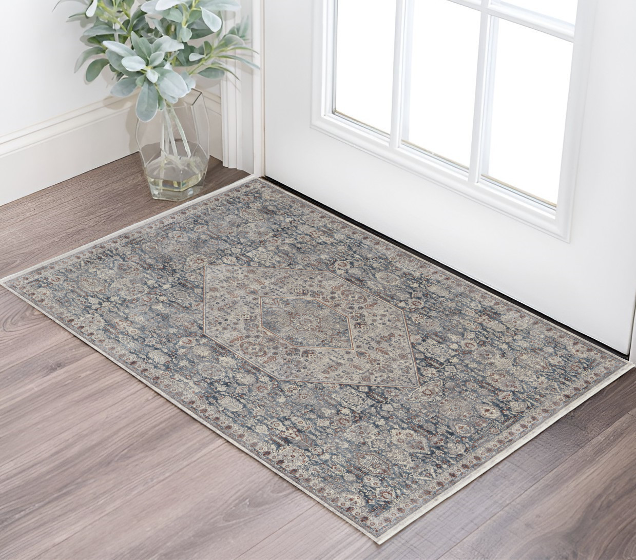 2" X 3" Blue and Ivory Floral Power Loom Area Rug