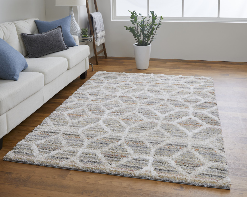 10" X 14" Tan Taupe And Ivory Geometric Power Loom Stain Resistant Area Rug