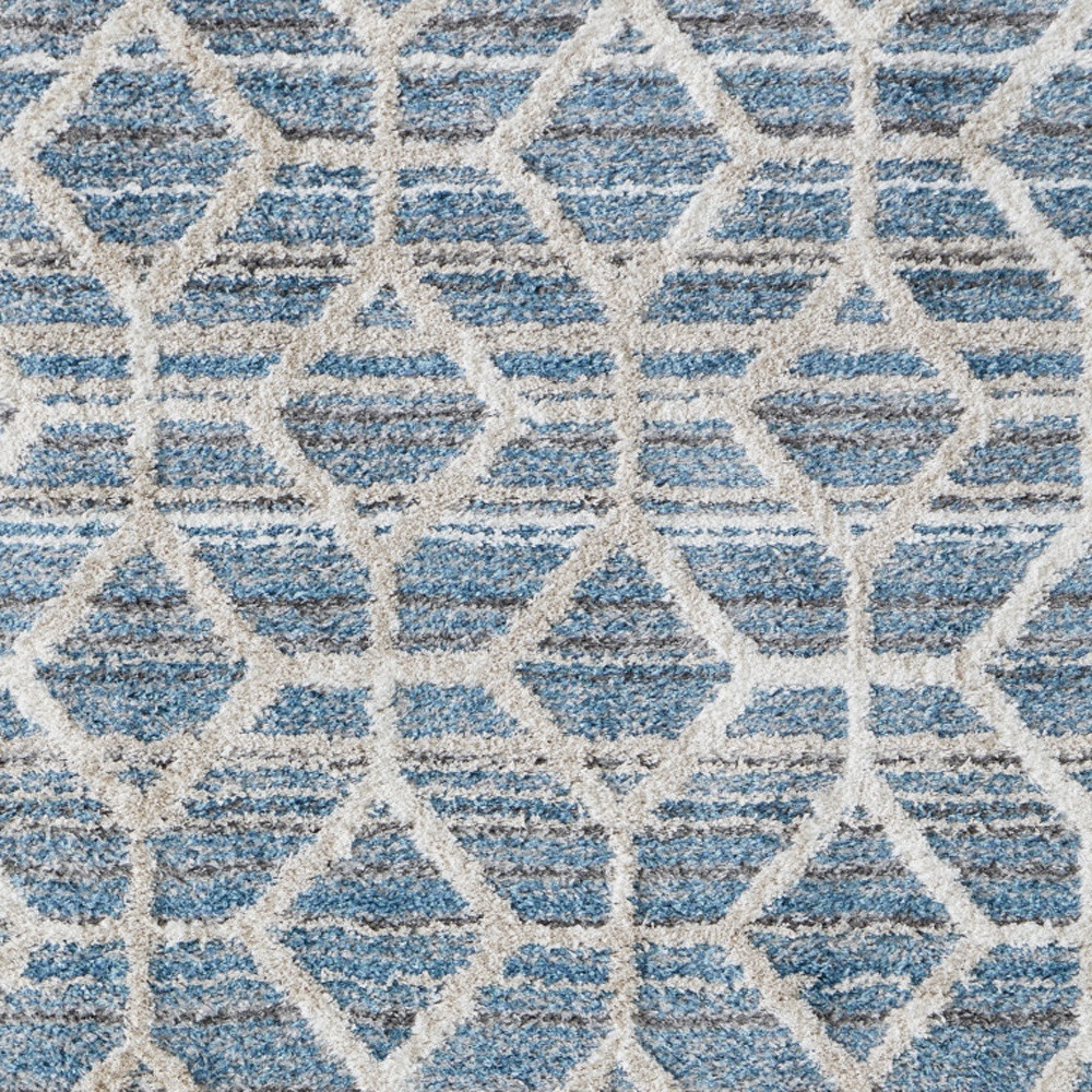 4" X 6" Blue And Ivory Geometric Power Loom Stain Resistant Area Rug