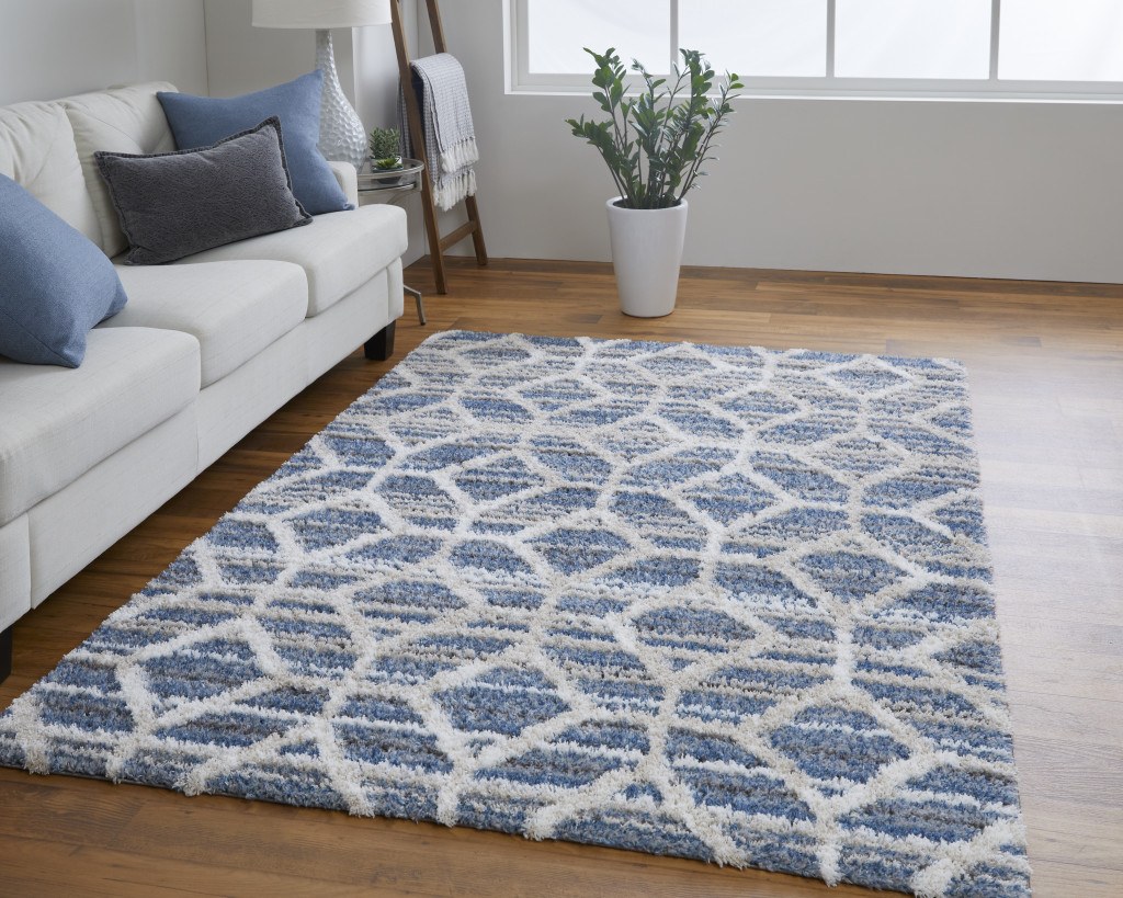 5" X 8" Blue And Ivory Geometric Power Loom Stain Resistant Area Rug