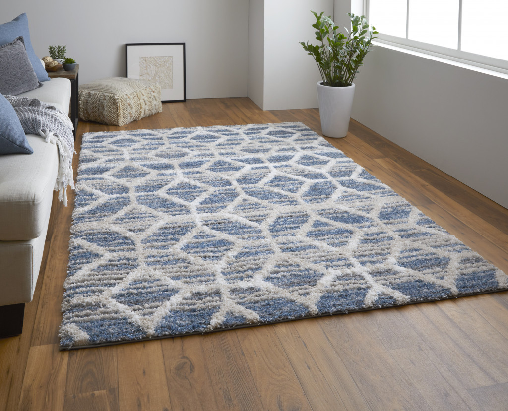 5" X 8" Blue And Ivory Geometric Power Loom Stain Resistant Area Rug