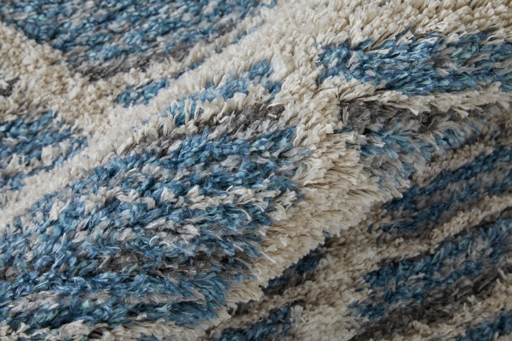 5" X 8" Blue And Ivory Geometric Power Loom Stain Resistant Area Rug