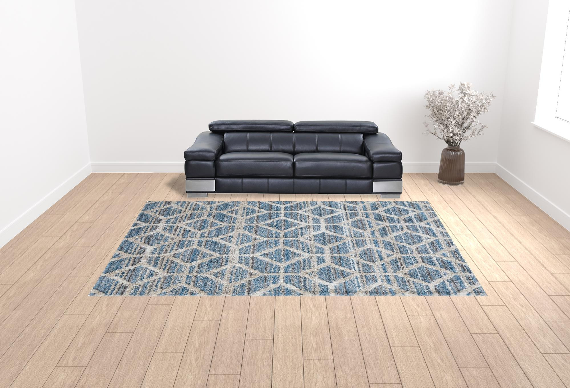10" X 14" Blue And Ivory Geometric Power Loom Stain Resistant Area Rug