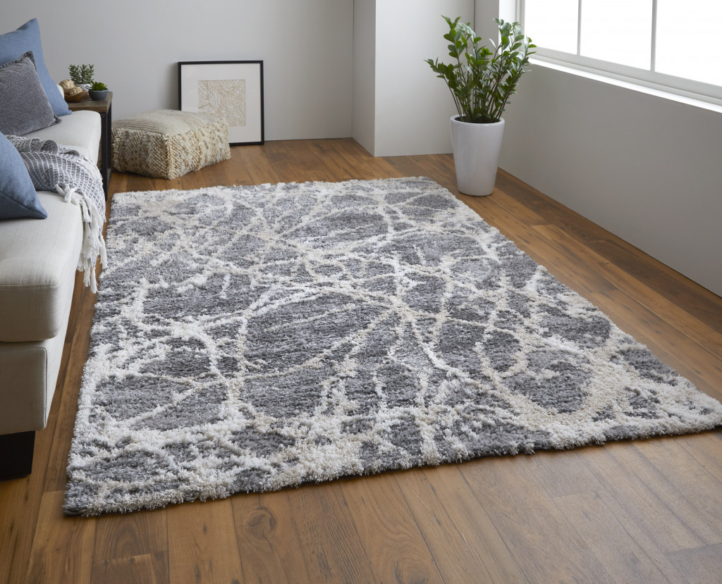 9" X 12" Gray And Ivory Abstract Power Loom Stain Resistant Area Rug