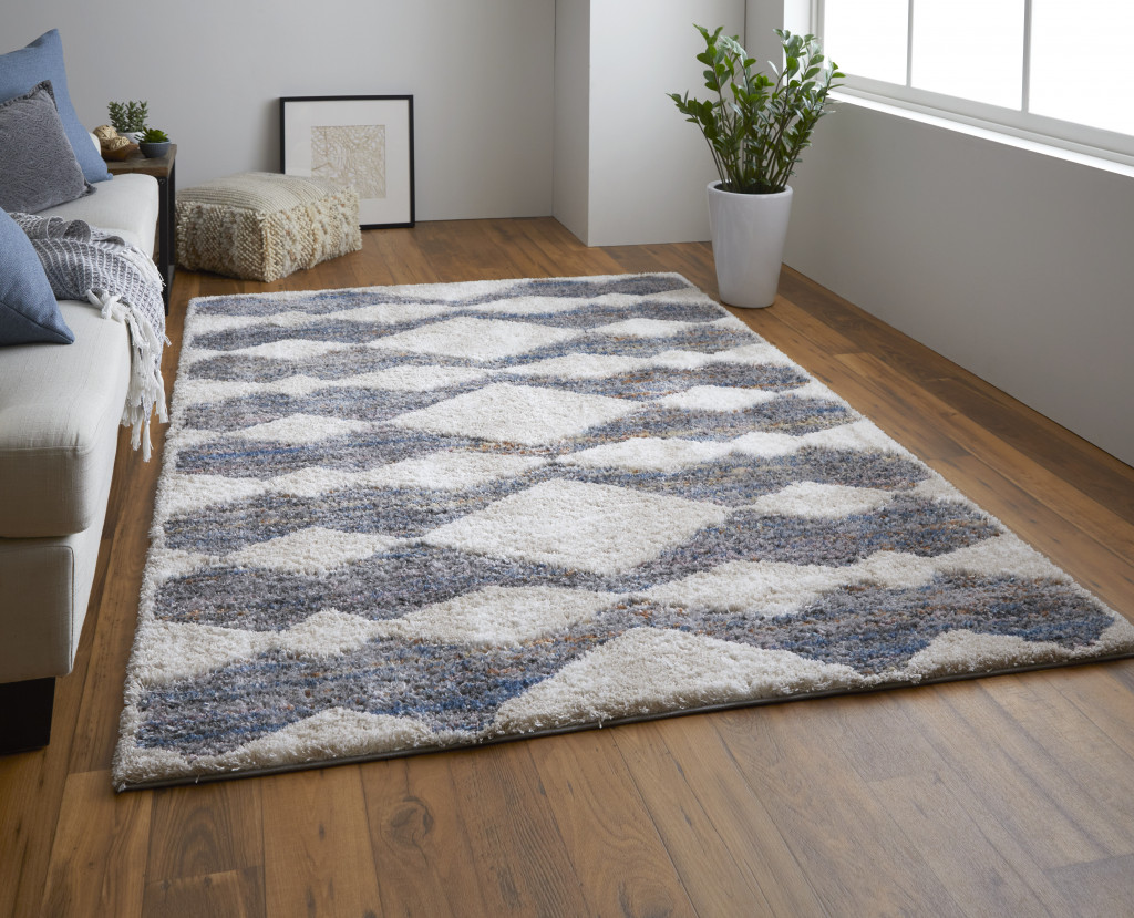 9" X 12" Tan Ivory And Blue Chevron Power Loom Stain Resistant Area Rug