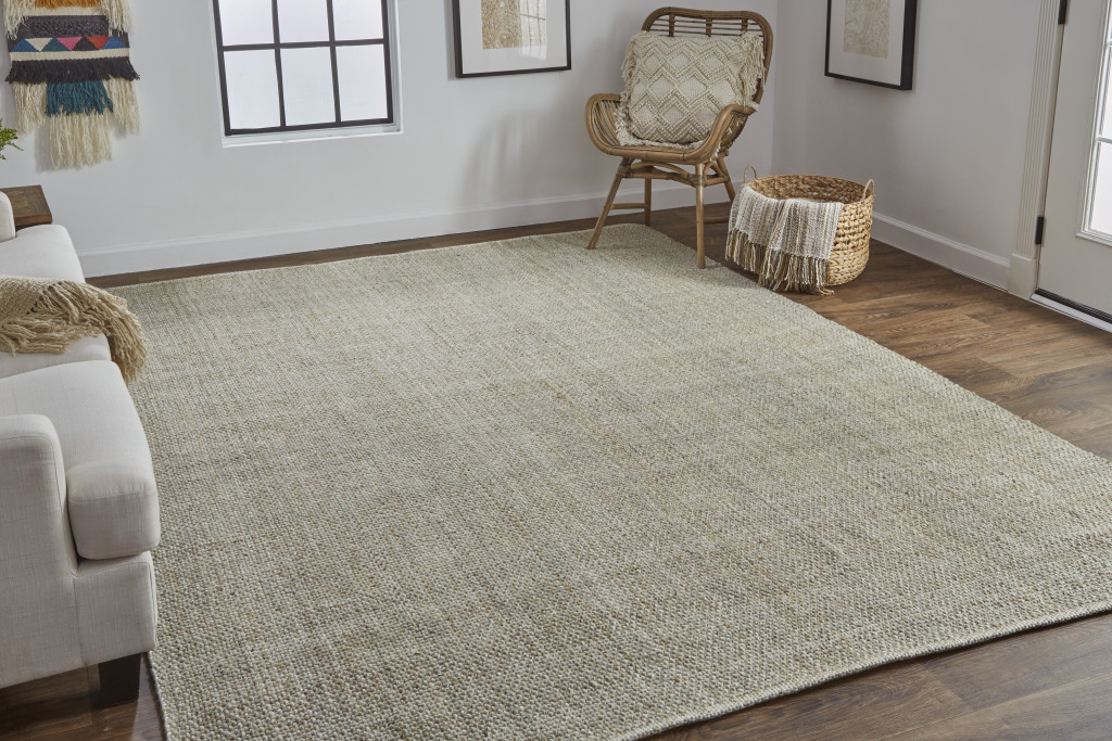 2" X 3" Green And Tan Hand Woven Area Rug