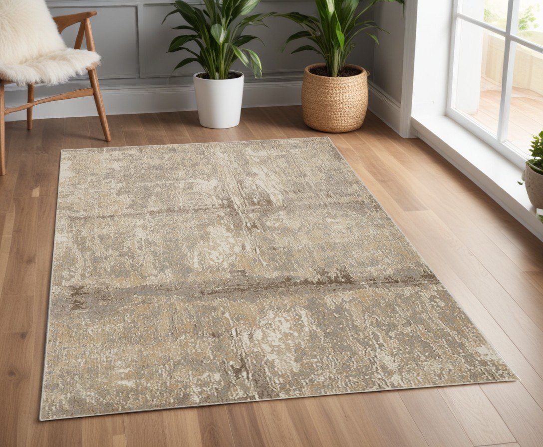 4" X 6" Tan and Ivory Abstract Non Skid Area Rug