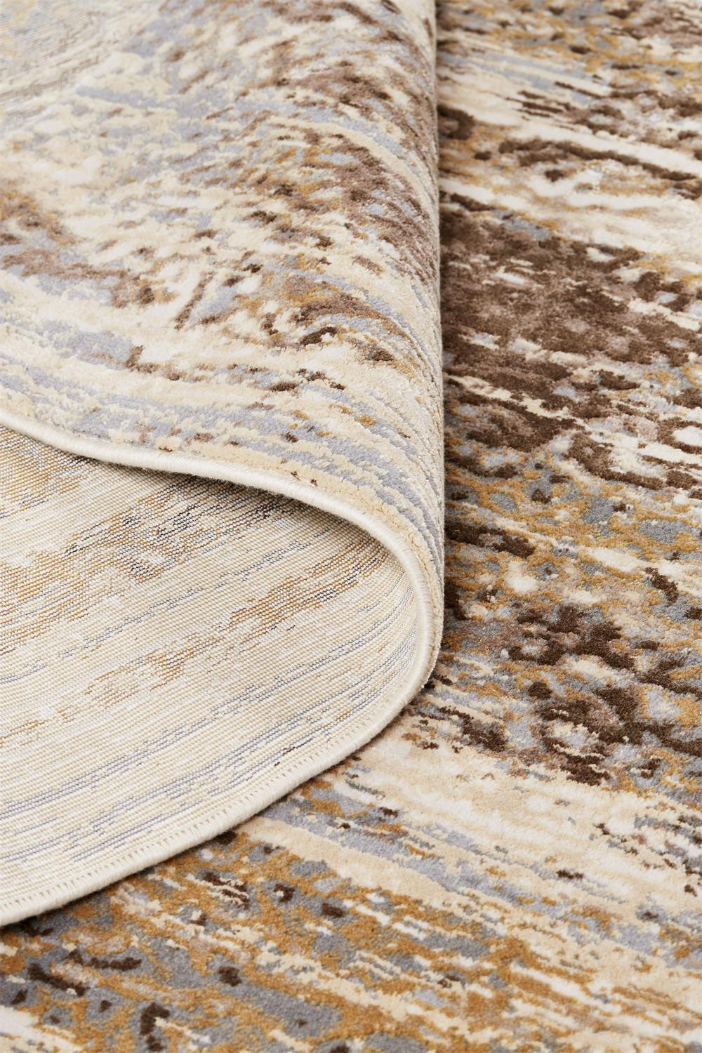 5" X 8" Tan and Ivory Abstract Non Skid Area Rug