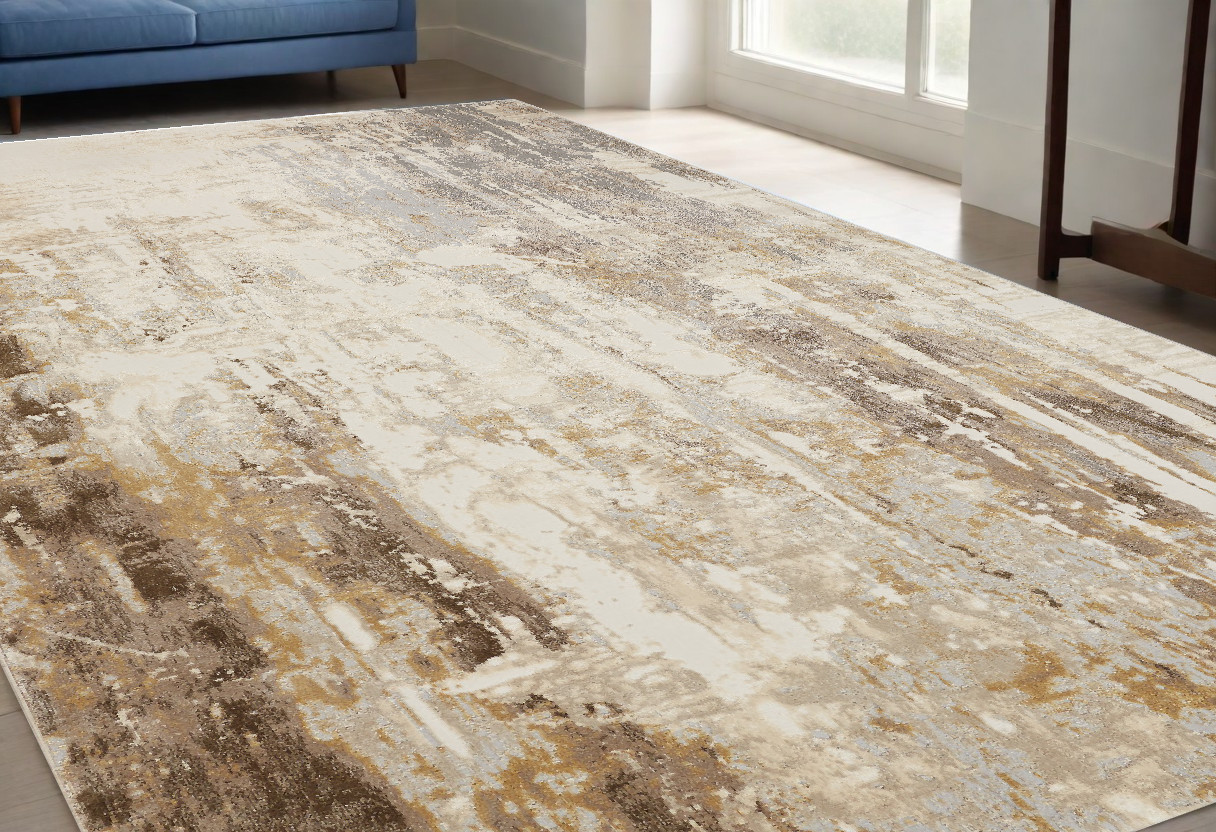 5" X 8" Tan Ivory And Gray Abstract Area Rug