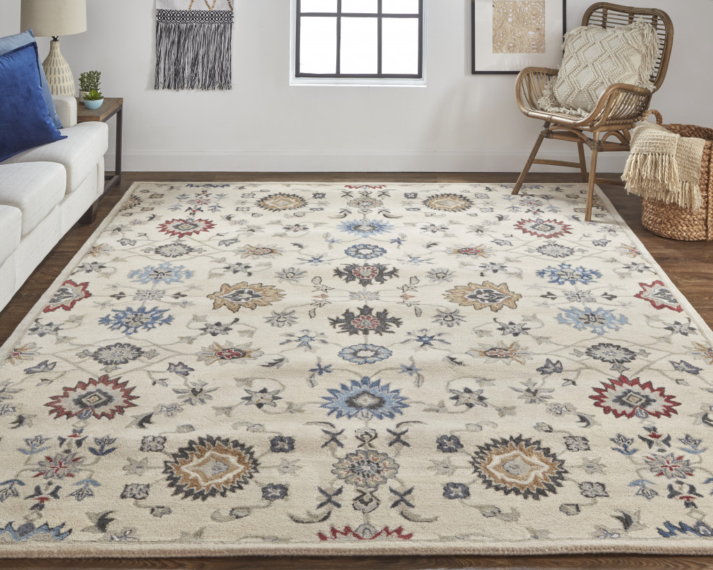 8 X 10 Ivory Blue And Tan Wool Floral Tufted Handmade Stain Resistant Area Rug