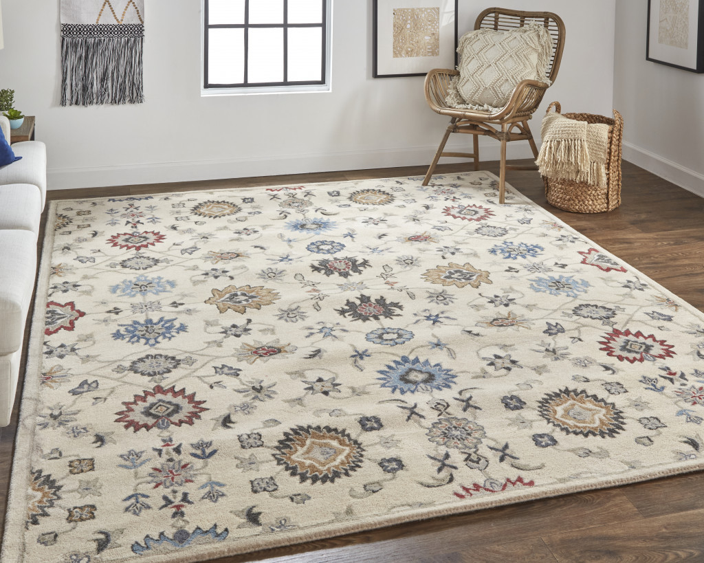 8 X 10 Ivory Blue And Tan Wool Floral Tufted Handmade Stain Resistant Area Rug