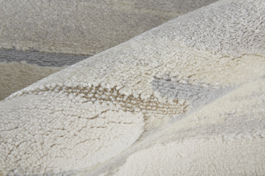 7" X 10" Ivory and Gray Abstract Power Loom Distressed Area Rug
