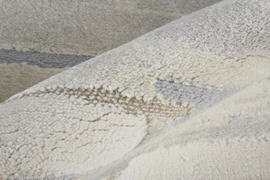 9" X 12" Brown and Ivory Abstract Power Loom Distressed Area Rug