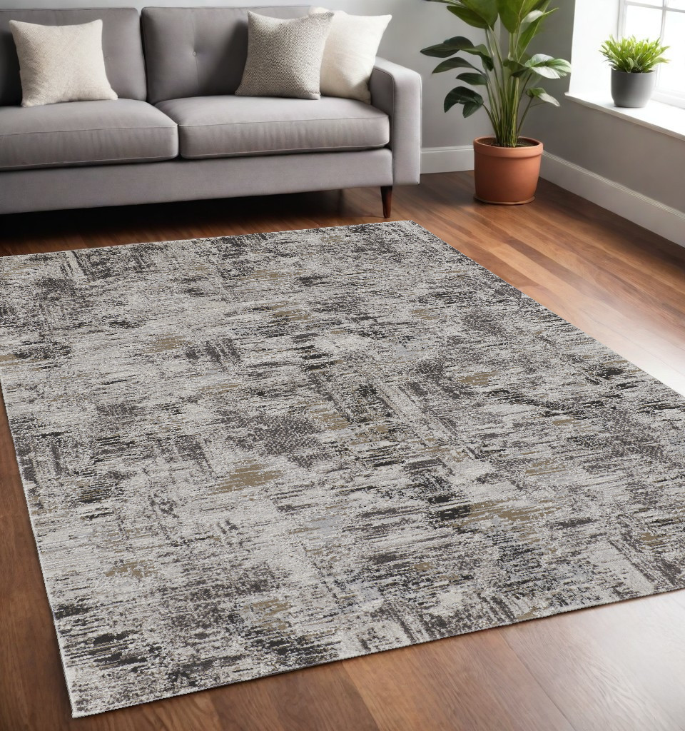 5" X 8" Gray and Ivory Abstract Power Loom Distressed Area Rug