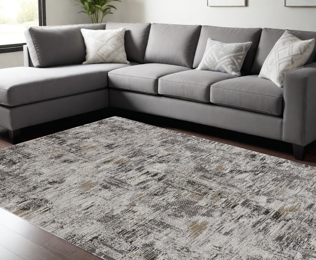 9" X 12" Gray and Ivory Abstract Power Loom Distressed Area Rug
