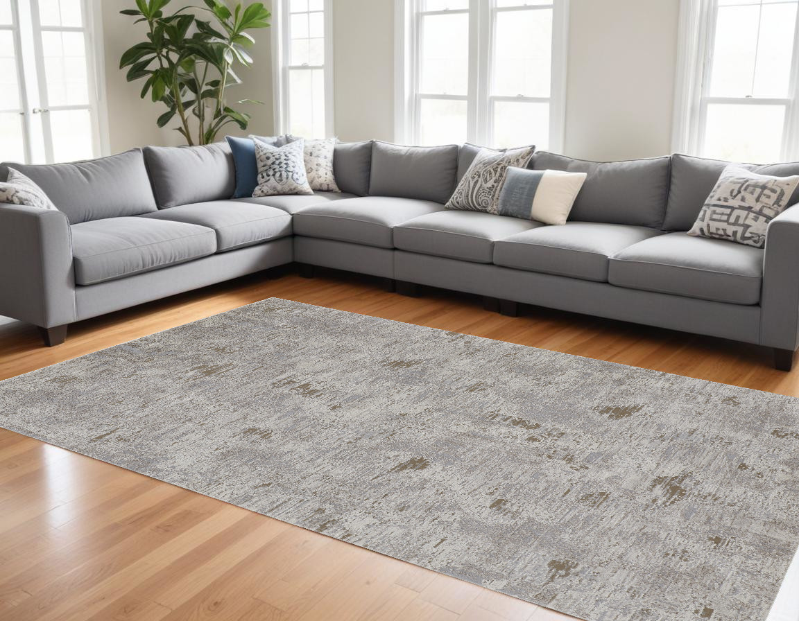 9" X 12" Gray and Ivory Abstract Power Loom Distressed Area Rug