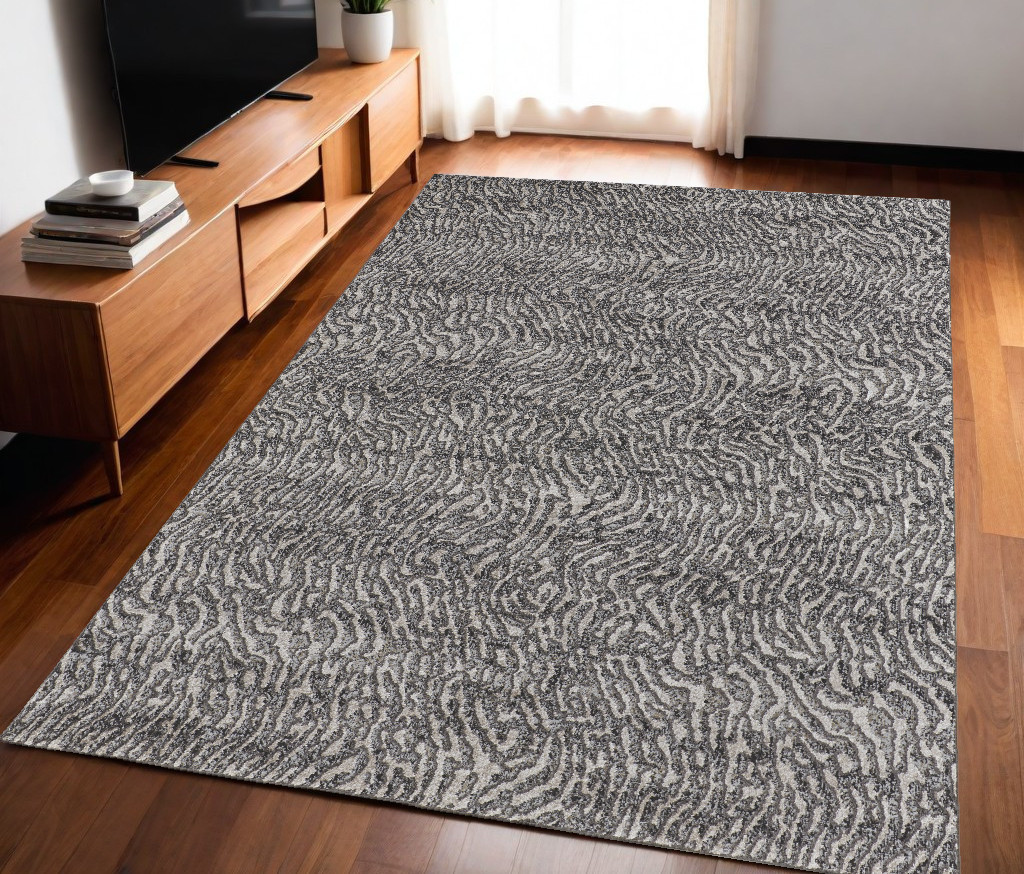 5" X 8" Gray and Ivory Abstract Power Loom Area Rug