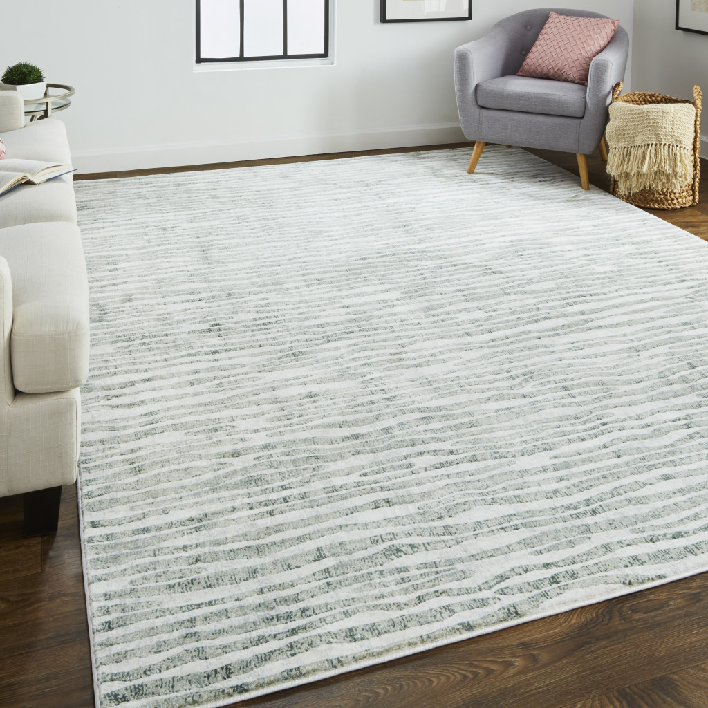10" X 13" Gray Green And Ivory Striped Distressed Stain Resistant Area Rug