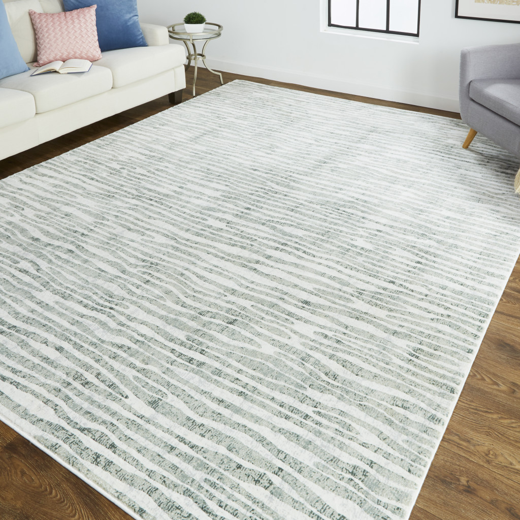 10" X 13" Gray Green And Ivory Striped Distressed Stain Resistant Area Rug