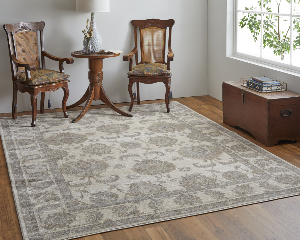 9" X 12" Tan Ivory And Brown Power Loom Area Rug