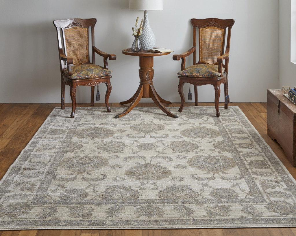 9" X 12" Tan Ivory And Brown Power Loom Area Rug
