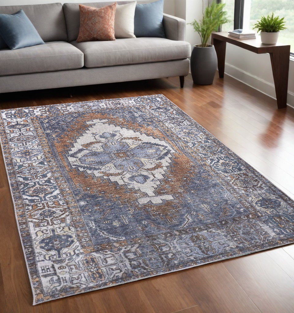 5" X 8" Blue Ivory And Brown Floral Area Rug