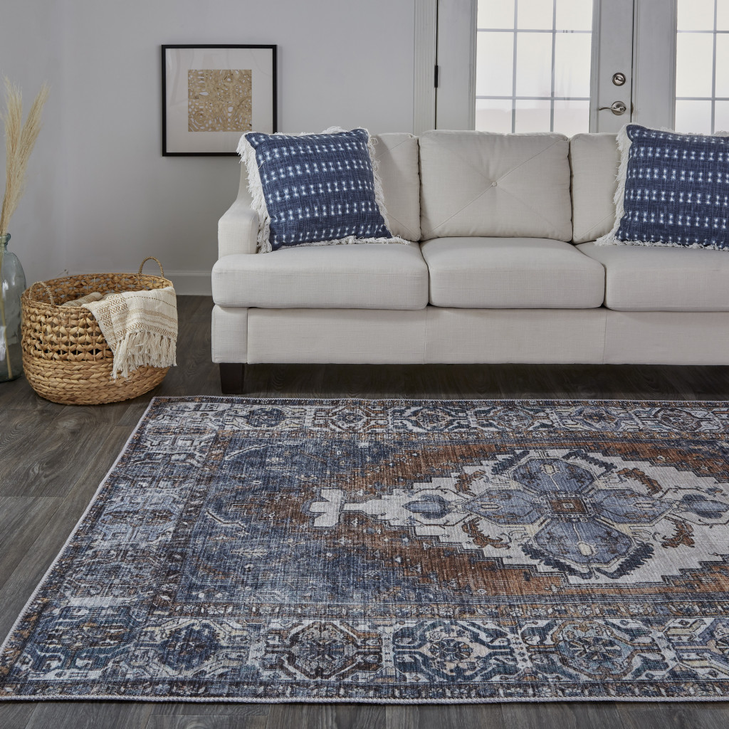 5" X 8" Blue Ivory And Brown Floral Area Rug