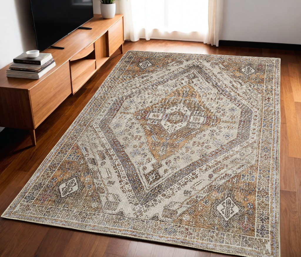 5" X 8" Ivory Blue and Orange Medallion Distressed Washable Area Rug