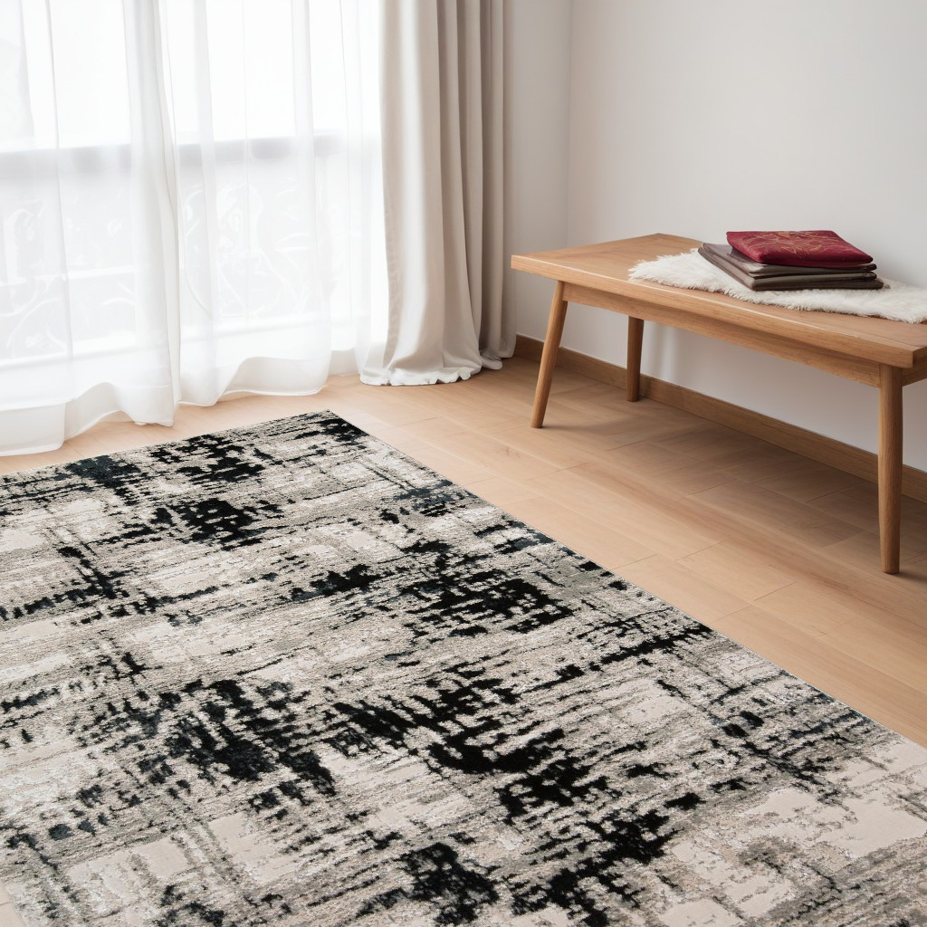 5" X 8" Black White And Gray Stain Resistant Area Rug