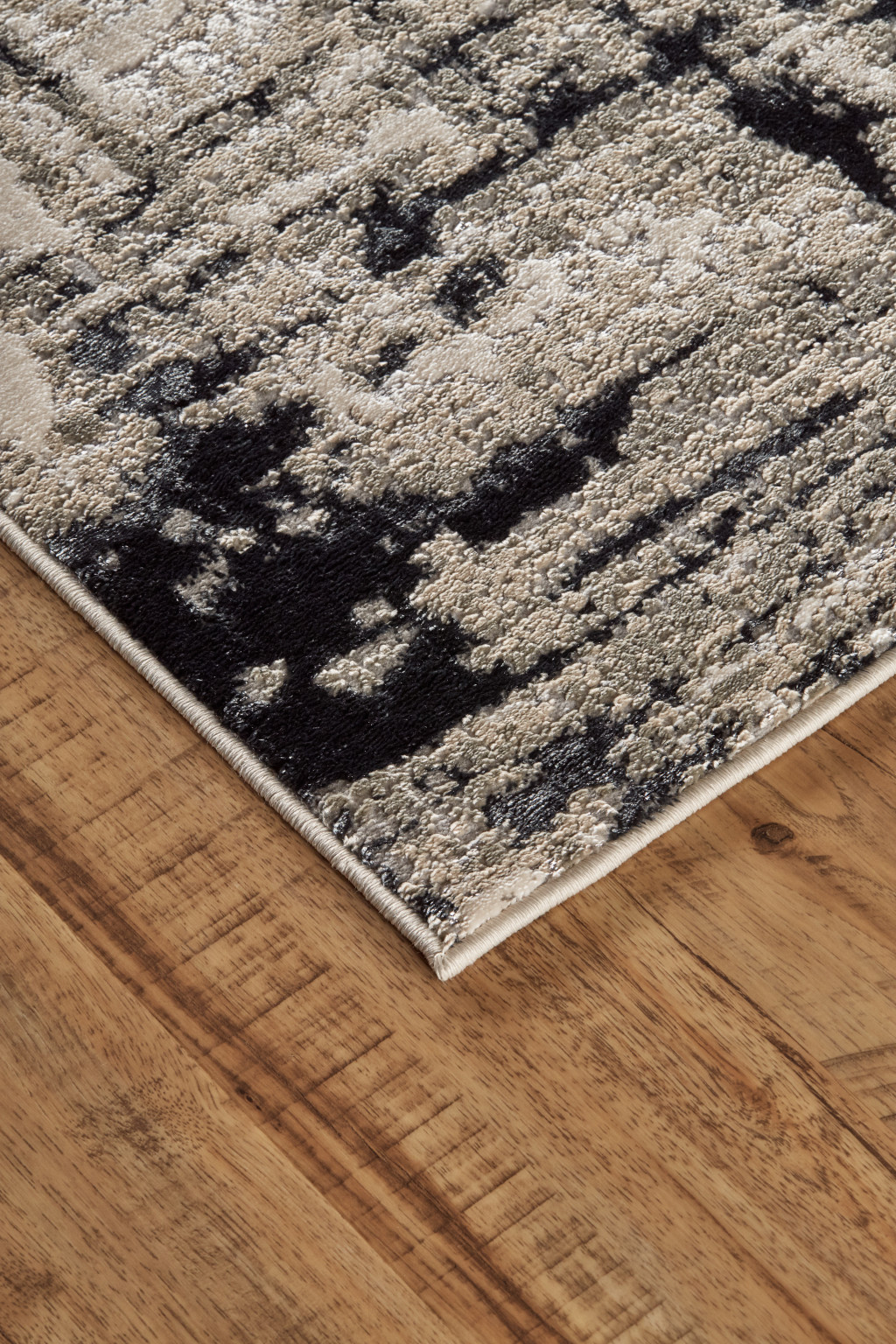 7" X 10" Black White And Gray Stain Resistant Area Rug