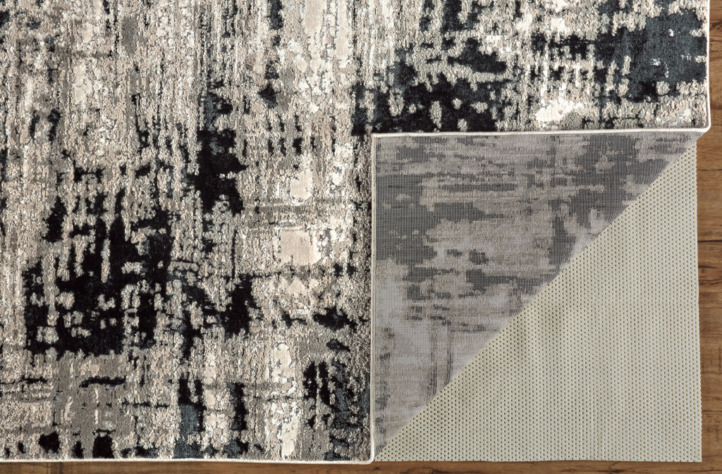 7" X 10" Black White And Gray Stain Resistant Area Rug