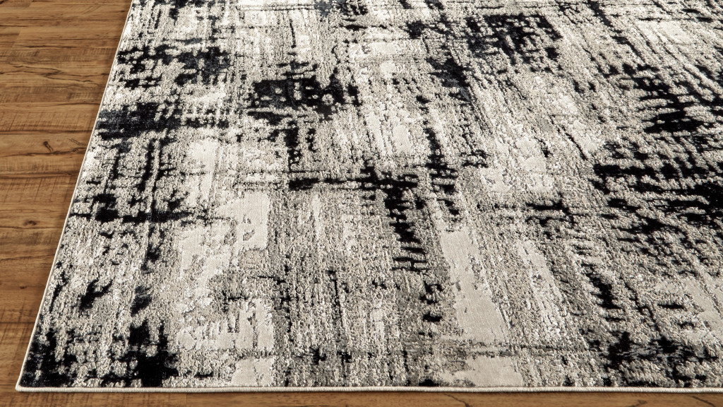 7" X 10" Black White And Gray Stain Resistant Area Rug
